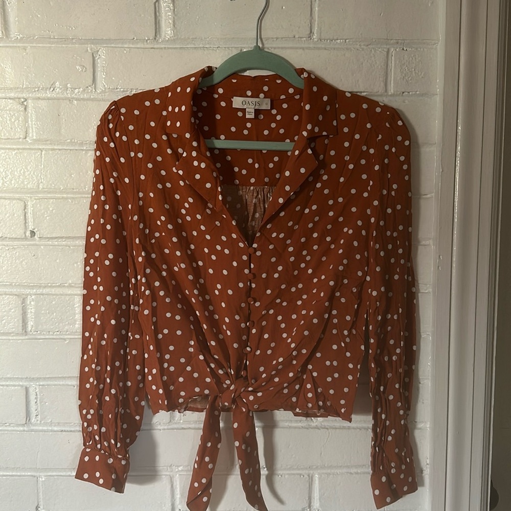 Burnt orange and white polka dot cropped blouse